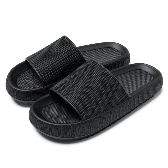 Mjuka stötdämpande tofflor i memory foam för inomhusbruk