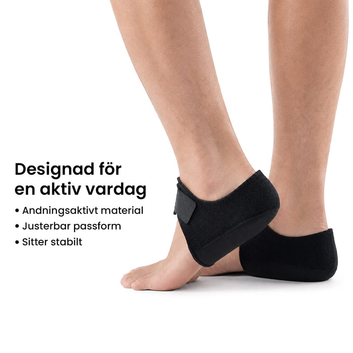Mjuka, justerbara hälkuddar som ger avlastning och stöd vid hälsporre. Andas. Förpackning med 1 par.