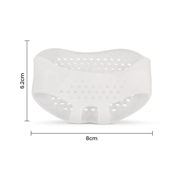 Vit, perforerad fotdyna, 6,2 × 8 cm, från Kroppsbutiken. Ger en liknande känsla som fotdynor av gelmaterial.